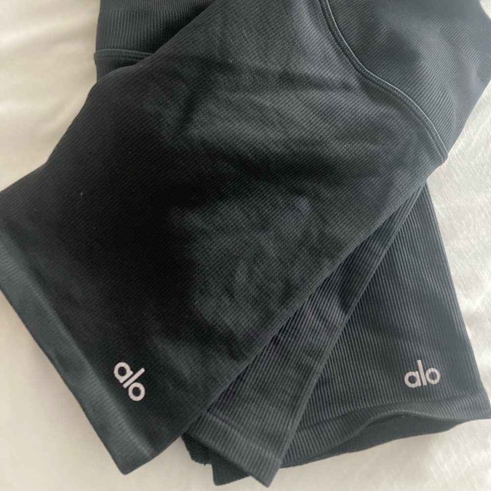 Three pairs Alo ribbed bike shorts